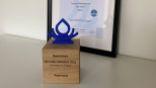 Drupal Splash Award Urkunde und Pokal für die Tojio GmbH